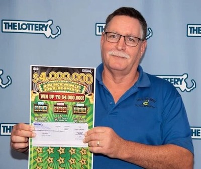Repeat Lottery Winner Rolf Rhodes Holding $4 Million Scratcher