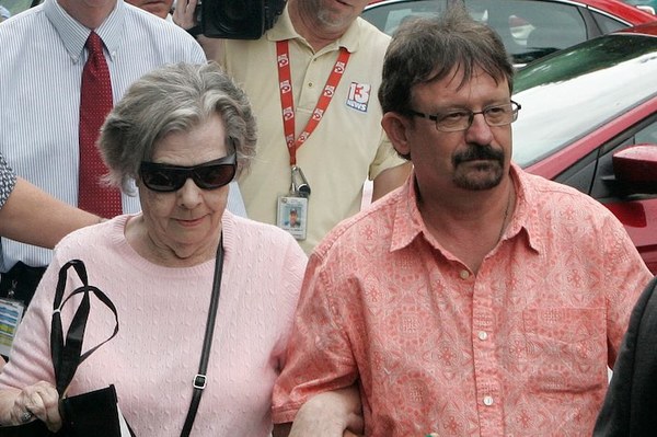 Gloria Mackenzie Walking with Son Scott