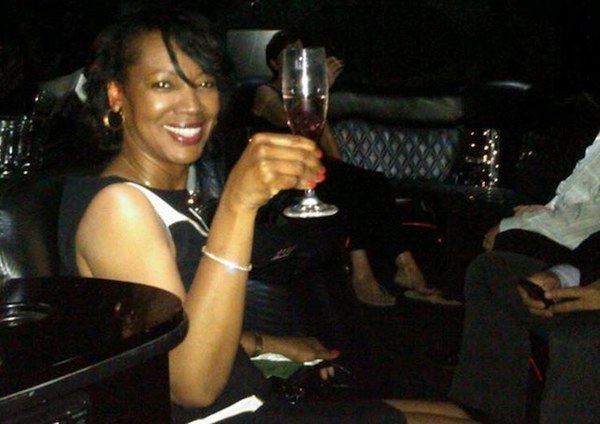 Ira Curry Toasting Champagne in Limo