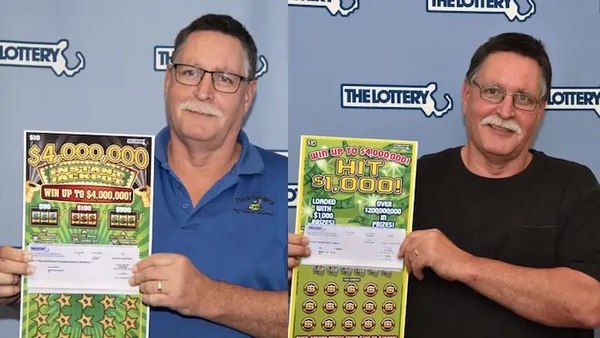 Rolf Rhodes Holding Two Winning Scratchers